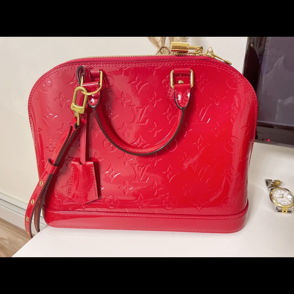 Luis Vuitton Alma PM handbag with Strap Brand New